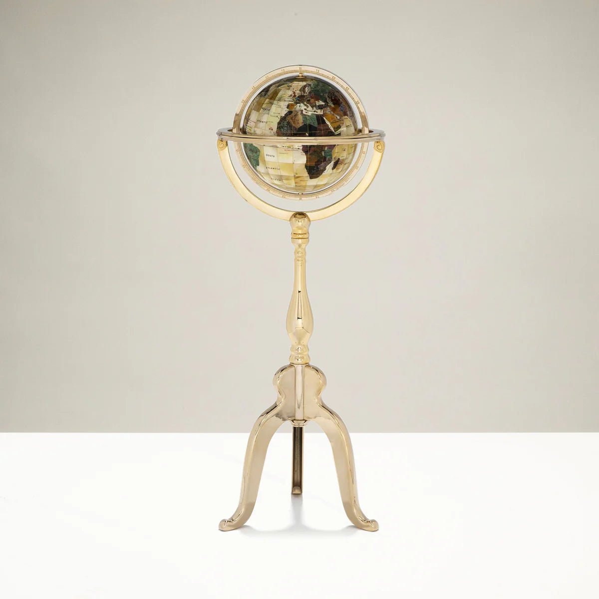 9 Gemstone Globe with a Mother of Pearl Full Cut Ocean on a Gold Colored Masterpiece Stand - Xformerz